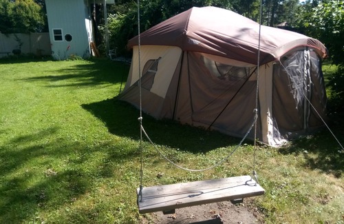 Kenosha Apartment | Backyard Tent Wakling distance to the beach