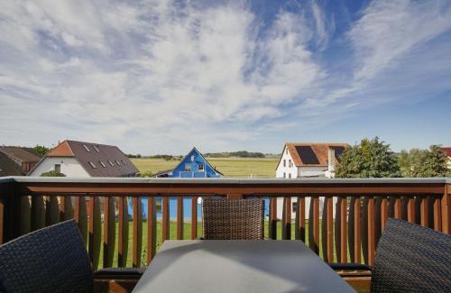 Thiessow Apartment | Balkon mit Meerblick, gratis Nutzung vom AHOI Erlebnisbad und Sauna in Sellin - Haus De niege Wech FeWo 03