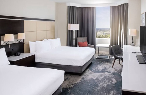 Redwood Shores Hotel | Bask in Modern Style Comfort! 2 Relaxing Units, Onsite Pool, Pets Allowed