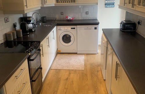 Woodhorn House | 'Bay View' Absolute Seafront 3 Bedroom House with Breath-taking Sea Views.