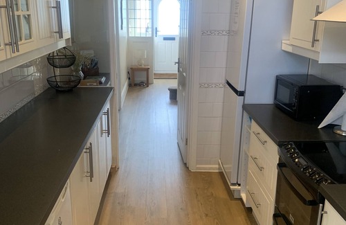 Woodhorn House | 'Bay View' Absolute Seafront 3 Bedroom House with Breath-taking Sea Views.