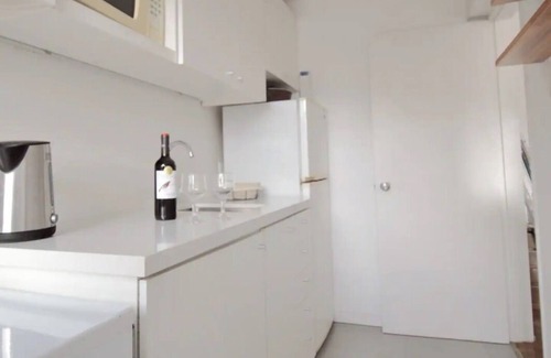Pocitos Apartment | Beach and city in Montevideo.