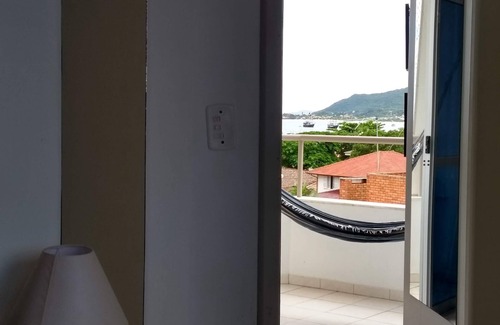 Cachoeira do Bom Jesus Apartment | BEACH APARTMENT WITH SEA VIEW JUST A FEW STEPS FROM THE SAND. COMPLETE GARAGE 1 DOR