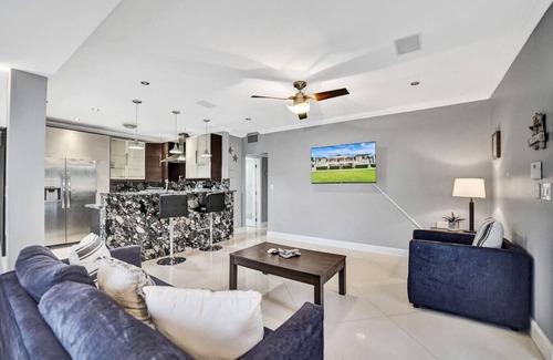 Hendricks and Venice Isles Apartment | Beach Isles: Modern 1BR Waterfront Apartment with Patio