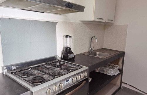 Puerto Juarez Apartment | Beachfront apartment Cancun next to Isla Mujeres C-601