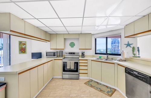 Sand Key Condo | Beachfront condo with multiple balconies, heated pool, gym, hot tub & AC