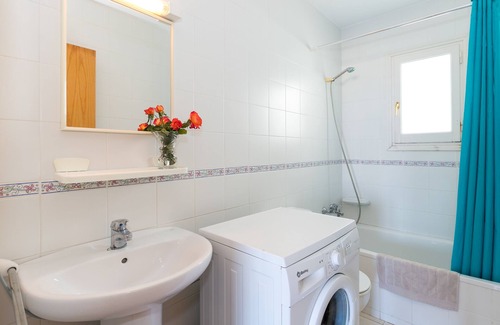 Arenal d'en Castell Apartment | Beachfront Apartment “Maluz” with Ocean View, Mountain View, Terrace & Shared Pool