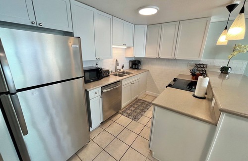 Punaluu Condo | BEACHFRONT PENTHOUSE WITH A/C right on FAMILY SAFE BEACH!