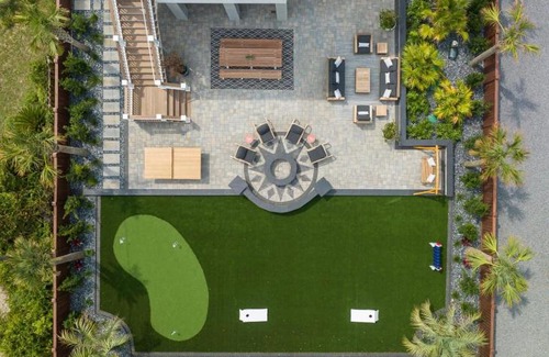 Folly Beach House | Beachfront Pool Outdoor Kitchen Firepit Putting Green