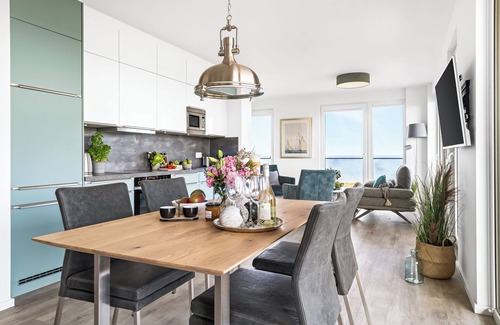 Olpenitz Apartment | "BeachWaveFour": Holiday apartment right on the beach with sauna, balcony & Baltic Sea view