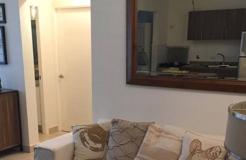 Tumba Vieja Apartment | Beautiful and cozy beachfront condo apartment near the city .