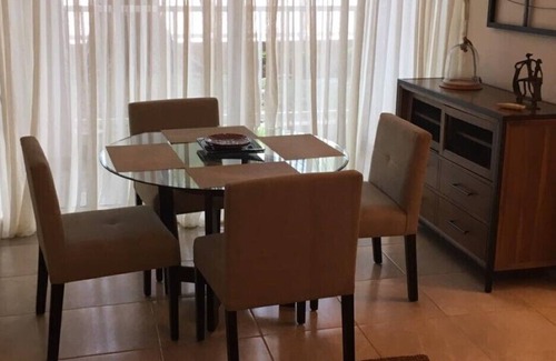 Tumba Vieja Apartment | Beautiful and cozy beachfront condo apartment near the city .