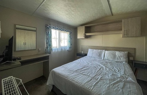 Felixstowe House | Beautiful caravan with free WiFi and decking at Suffolk Sands Park ref 45083C