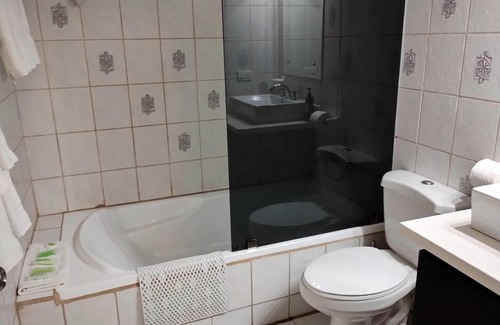 Ciudad Cariari Condo | Beautiful 1bd. condo on golf course near S.J airport - golf & tennis package