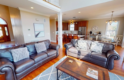 Ocean Point House | Beautiful home with open porches overlooking lagoon in Wild Dunes