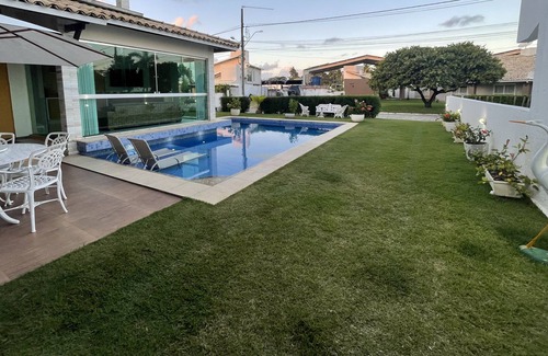 Aruanda House | Beautiful house with 5 bedrooms, in a closed condominium by the river.