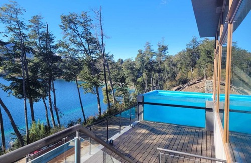 Correntoso Apartment | Beautiful lakefront apartment with heated pool