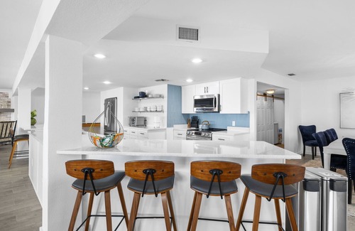 Baywood Village House | Beautiful Oceanfront 4BR Palm Harbor home w/pool, chef's kitchen, and boat dock