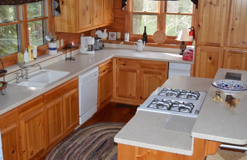 Lakemont Cabin | Beautiful Rustic Timberframe Lake House and Boat House Amid Trees