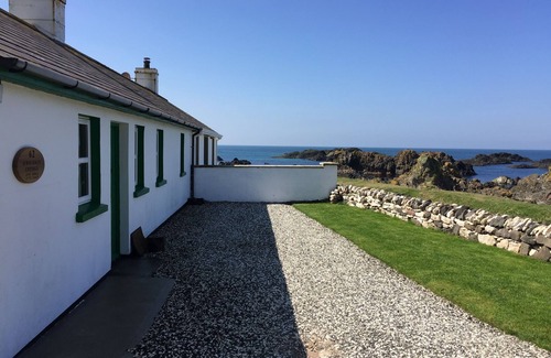 Ballycastle House | Beautiful seafront cottage, extensive private gardens, stunning sea views.