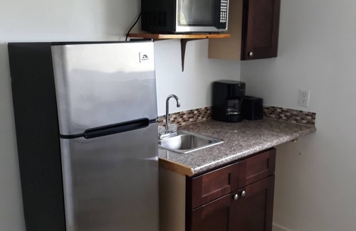 Gambier Apartment | Bell At The Airport Suites - Adults Only