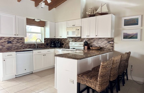 Key Colony Beach House | Best 2/2 in KCB. Private Pool/Private Dock/Lush backyard/Tiki & Outdoor Bar.