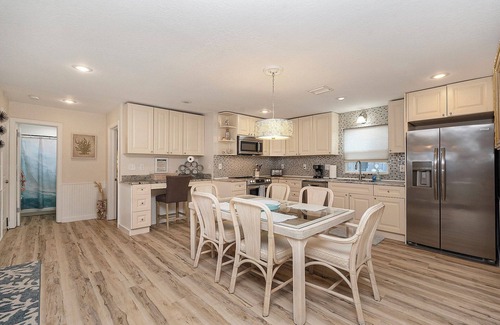 Sunset Beach House | BEST OF THE BEACH luxurious house just steps from the sand ALL the amenities!