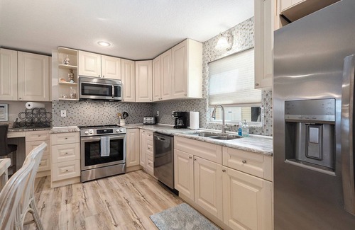 Sunset Beach House | BEST OF THE BEACH luxurious house just steps from the sand ALL the amenities!