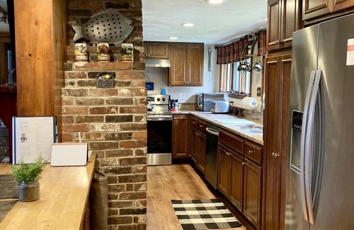 Lochmere Cottage | Big Pine Lakefront Cottage with Dock, Fire Pit & BBQ