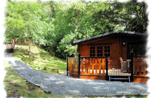 Skelwith Bridge House | Blelham Tarn Rustic cabin in tranquil woodland