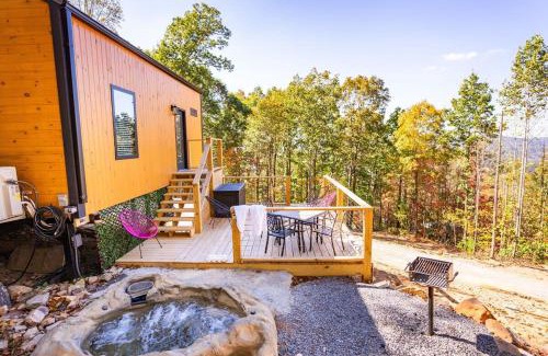 Wildwood House | Blooming Redbud Treehouse with private hot tub