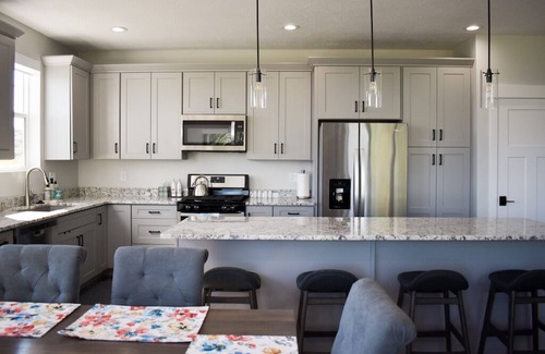 Sweetwater House | Blue Lake Retreat - fully-landscaped home sits on 2nd tee of Bear Lake G.C.