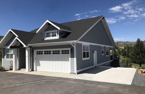 Sweetwater House | Blue Lake Retreat - fully-landscaped home sits on 2nd tee of Bear Lake G.C.