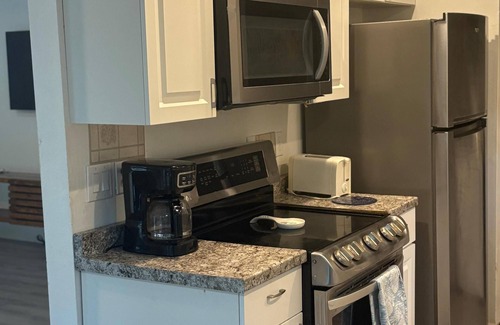 Fellowship House | Blue Sky StiltsHouse in a Secluded Forest.