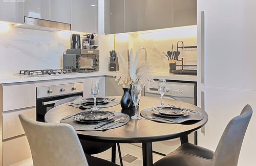 Nad Al Sheba Apartment | bnbme | Modern Apt with Pool & Gym | 12 min to Downtown