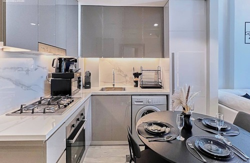 Nad Al Sheba Apartment | bnbme | Modern Apt with Pool & Gym | 12 min to Downtown