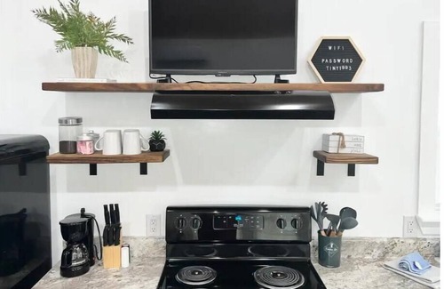 Albertville Cabin | Bobcat Tiny Luxury Cabin on Lake with Inflatables