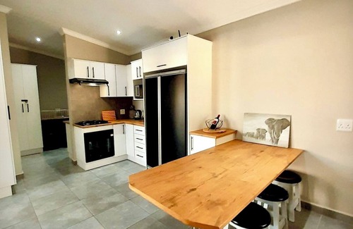 Marloth Park Cabin | Bordering Kruger National Park, this modern and spacious 3 bedroom lodge awaits