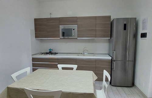 Peschici House | Brand new three-room apartment with veranda, pool and climate