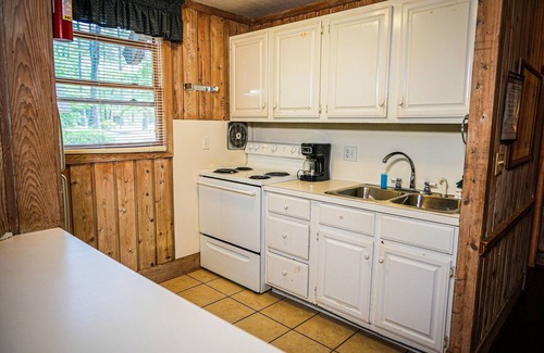 Pine Mountain Ski Chalet | Breathtaking view of Lake Innsbruck right from your own screened in porch.