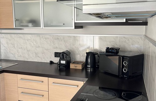 Ziano di Fiemme Apartment | Bright and comfortable apartment with mountain views.