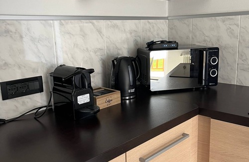 Ziano di Fiemme Apartment | Bright and comfortable apartment with mountain views.