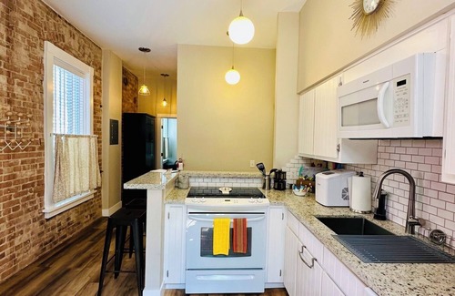 Bisbee House | Brownstone Patio Suite-Historic Building in the Heart of Historic Downtown Bisbee