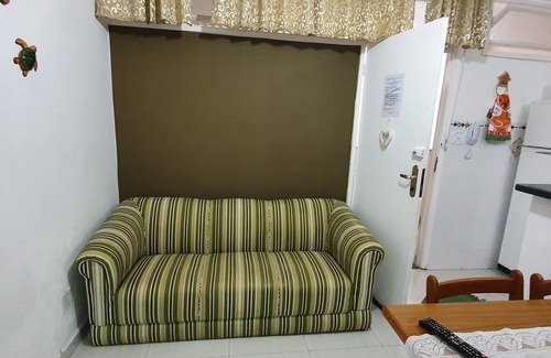 Jose Menino Apartment | BUILDING FACING THE SEA AND OUTLET - WI-FI, SUN UMBRELLA, COOLER AND CHAIRS