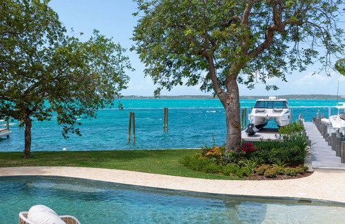 Dunmore Town House | Buttonwood – Bayfront Luxury Villa with Private Dock + Pink Sands Beach Access