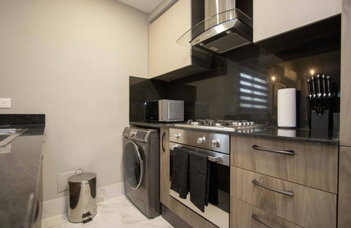 Yolanda Morales Apartment | Céntrico con Piscina+bbq+gym+espacio de Trabajo y Personal en el Lobby 24/7