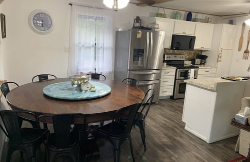 Doniphan House | Cabin Right on Current River, conveniently located close to town.