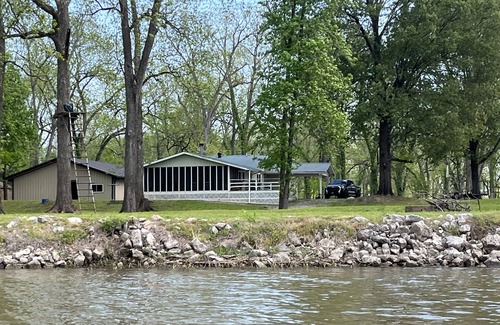 Wright House | Cabin sits in the back of a wild pecan grove over looking the Arkansas River
