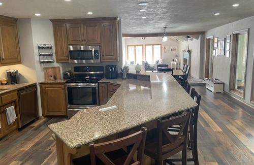 New London House | Cabin Style Home in Woods, Private Pool, Hot Tub, Snowmobile, Fire Pit, Horses.