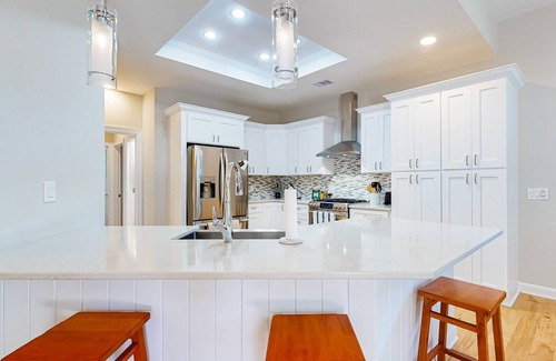 Moss Creek House | Calm home with patio, enclosed yard, tennis court, golf courses, & heated pool